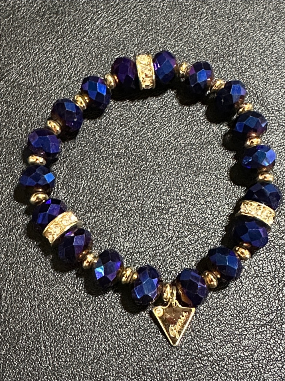 Guess Royal Blue Faceted Crystal Gold Tone Accent Stretch Bracelet